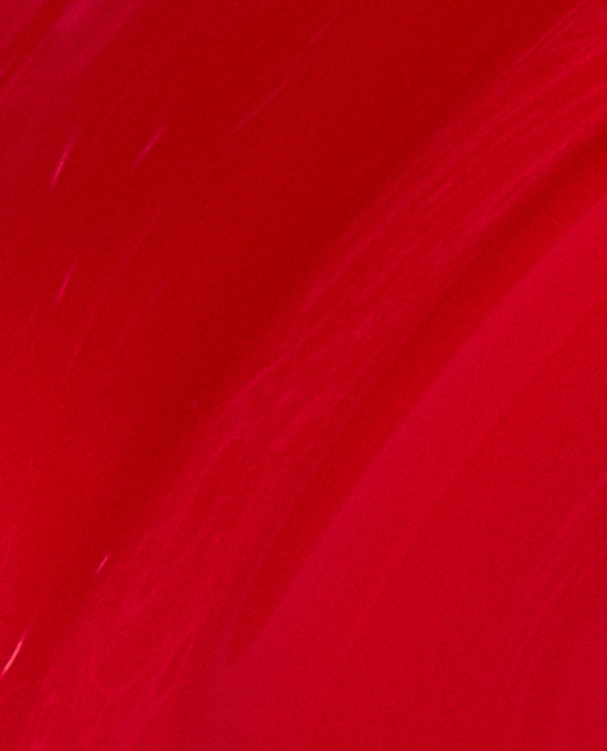 Glossy brushstroke swatch of OPI Big Apple Red nail lacquer showing rich, vibrant classic red color, ideal for holiday manicures or an OPI nail polish gift set product detail closeup.