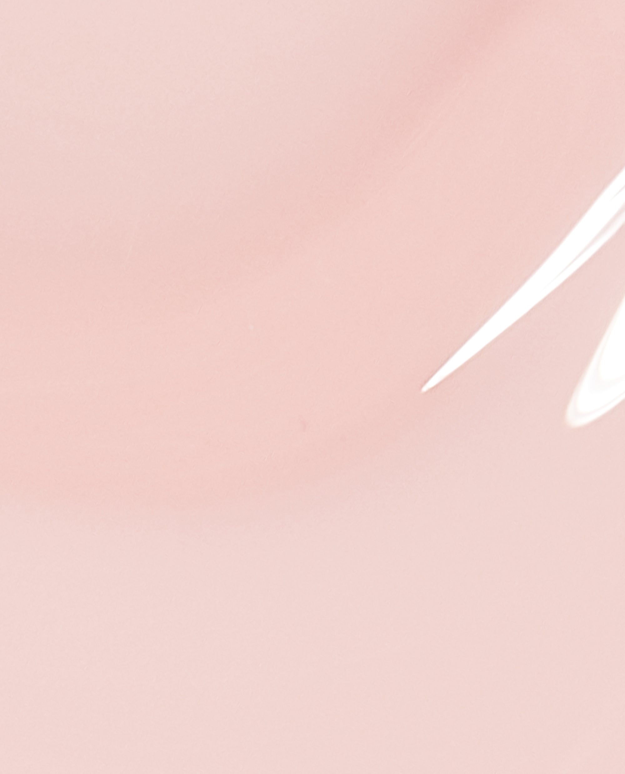 Soft blush-pink OPI Put it in Neutral nail lacquer swatch pooling in a smooth, glossy layer, showcasing the sheer neutral shade and shiny finish for an elegant nail polish gift set option.